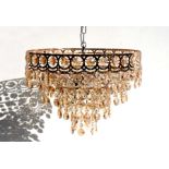 A modern ceiling light with champagne coloured crystal drops, 39cms diameter.