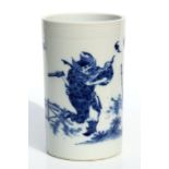 A Chinese blue & white brush pot of cylindrical form decorated with figures by a bridge in a
