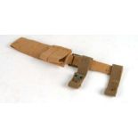 An unissued 08 Pattern bayonet frog with helve strap and carrier. Marked to the reverse of the