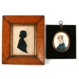 A 19th century silhouette portrait miniature in a maple frame; together with a Georgian oval