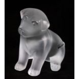 A modern Lalique frosted glass model of a seated puppy, etched Lalique, France G060 to the