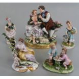 A group of continental porcelain figures to include Capodimonte and Dresden, the largest 22cms