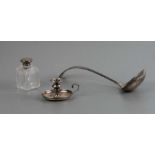 A silver chamber stick, Birmingham 1915; together with a silver mounted scent bottle; and a silver