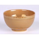 A Chinese café au lait ground tea bowl, the russet brown glaze with metallic sheen and gilt