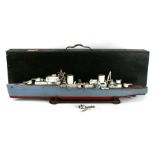 A scratch built wooden model of a destroyer battleship, 84cms wide, in a wooden carrying case, 90cms