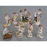 A group of continental porcelain cherub musicians and other figures, Capodimonte and other makers,