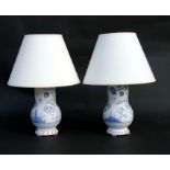 A pair of decorative ceramic table lamps, 22cms high.Condition ReportBoth good condition