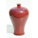 A Chinese Sang de Boeuf meiping vase, 27cms high.