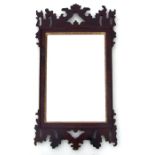 A George III mahogany fretwork rectangular wall mirror with bevel edged plate, 55cms wide.