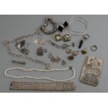 A quantity of silver and white metal costume jewellery.