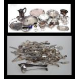 A large quantity of silver plated items to include tea sets and trays.