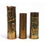 Three brass trench art shell cases, one with an etched Chinese scene, the largest 28cms high (3).