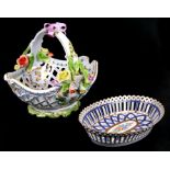 A Herend pierced handled basket decorated with butterflies with applied flowers and ribbon, 27cms