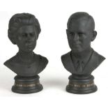 A Royal Doulton Queen Elizabeth II and Duke of Edinburgh limited edition black basalt busts with