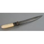 A late 19th century Burmese Dha dagger with ivory handle and white metal mount, 2cms long.