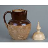 A 19th century Doulton Lambeth stoneware saltglazed harvest jug, 16cms high; together with a similar