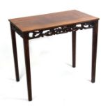 A 19th century oak side table with pierced and carved frieze, on tapering square legs, 78cms wide.