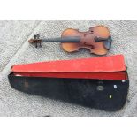 A one-piece back violin, overall approx 59cms long, cased, with bow.