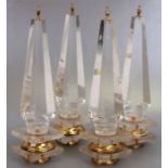 A set of four Perspex obelisks, 41cms high (4).Condition Reportfinial on one obelisk detached