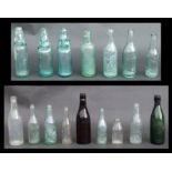 A quantity of sixteen vintage soda glass bottles by Trasks, Yeovil (16).