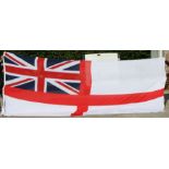 A massive cloth Royal Navy White Ensign Flag. Printed along the edge: WHITE ENSIGN 12 BDTH