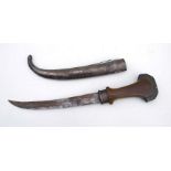 A 19th century Arabian Jambiya dagger with rhino horn hilt. Blade length 23cms (9ins)