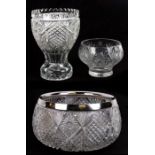 A George V cut glass punch bowl with hobnail cut decoration and silver collar, London 1933, 28cms