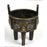 A Chinese bronze censer of small proportions, 7.5cms diameter.