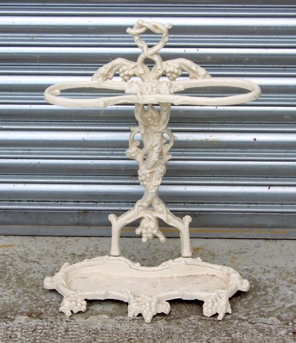 A Coalbrookdale style painted cast iron stick stand, 45cms wide.