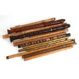 A quantity of wooden recorders and flutes (14).