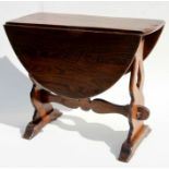 A small oak drop leaf occasional table. 58cm wide