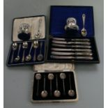 A boxed set of six silver teaspoons, Birmingham 1928; together with a cased set of Edwardian