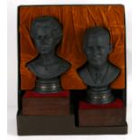 A Royal Doulton Queen Elizabeth II and Duke of Edinburgh limited edition black basalt busts with