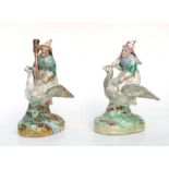 A pair of Victorian Staffordshire figures 'Mother Goose', 18cms high (2).