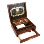 A Windsor & Newton mahogany artist box containing tubes of paints and a lower drawer with