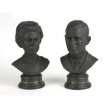 A Royal Doulton Queen Elizabeth II and Duke of Edinburgh limited edition black basalt busts with