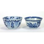 A Chinese blue & white tea bowl decorated with flowers, 7cms diameter; together with another