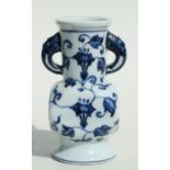 A Chinese blue & white two-handled vase with square section body decorated with scrolling