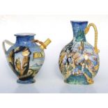 An Italian Cantagalli Maiolica style water jug, 23cms high; together with a similar jug, 28cms