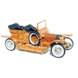 Part of the Gordon Woodham collection, a scratch built wooden Rolls Royce Silver Ghost. Overall