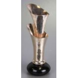 A Ravissant Indian sterling silver double vase with planished decoration, on a black marble base,