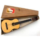 A Kapok Brand no. MG-101 guitar, overall 84cms long.