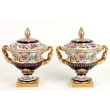 A pair of Bista Alegre Pintado a Mao two-handled urns and covers highly decorated with flowers and