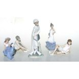 A group of Nao porcelain figures to include two ballerinas, a little girl in her nightdress, a