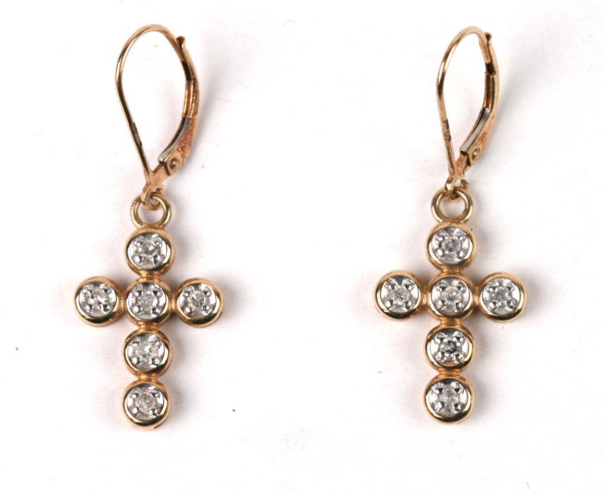 A pair of 9ct gold diamond set drop cross earrings, each cross with six diamonds, total weight