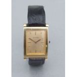 A Boucheron 18ct gold watch cased gentleman's wrist watch, the square gold dial with baton markers