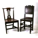 A 19th century oak Wainscot type chair with panelled back and solid seat, on turned front legs