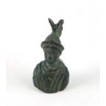 A bronze pendant or weight modelled as a bust of a Roman or Greek soldier, 4cms high.