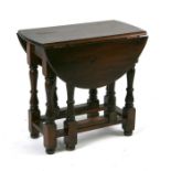 A small oak gateleg table, 53cms wide.