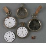 A group of Omega pocket watches, dials and cases; together with a ladies Omega watch movement.
